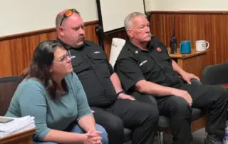Pictured (left to right): Abby Gribi, Newport City Administer; Eric Gallanger, Paramedic with POEMS; and Chief Brad Martin.